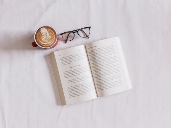 Person reading an English book